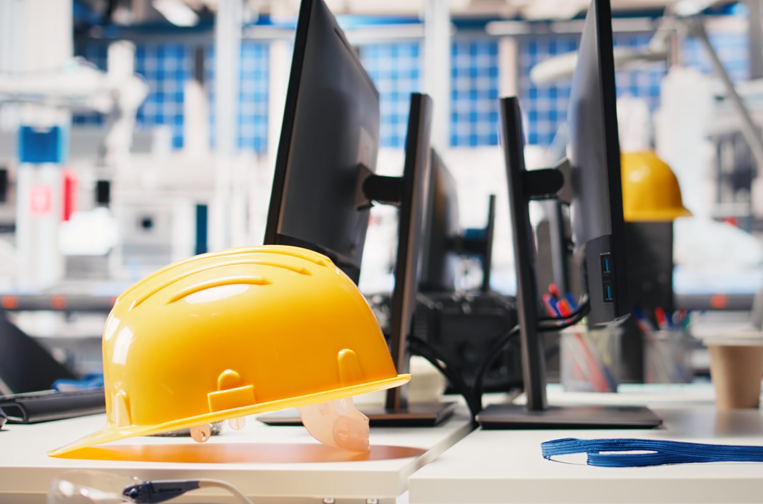 Computer display in solar panels manufacturing plant used to study solar energy systems. PC screen on desk in empty photovoltaics factory used to improve efficiency, sustainable solutions.
